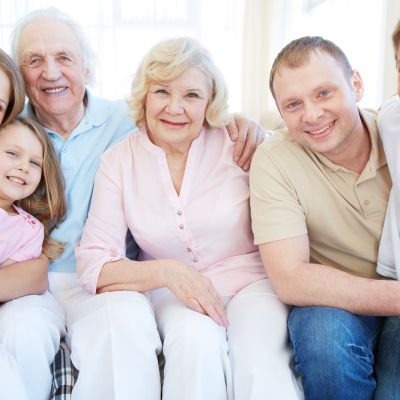 Family of Grandparents, parents and two kids.